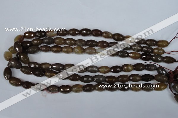 CAG3129 15.5 inches 10*14mm faceted rice brown line agate beads